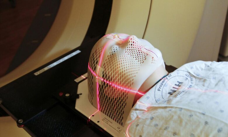 person lying inside MRI machine